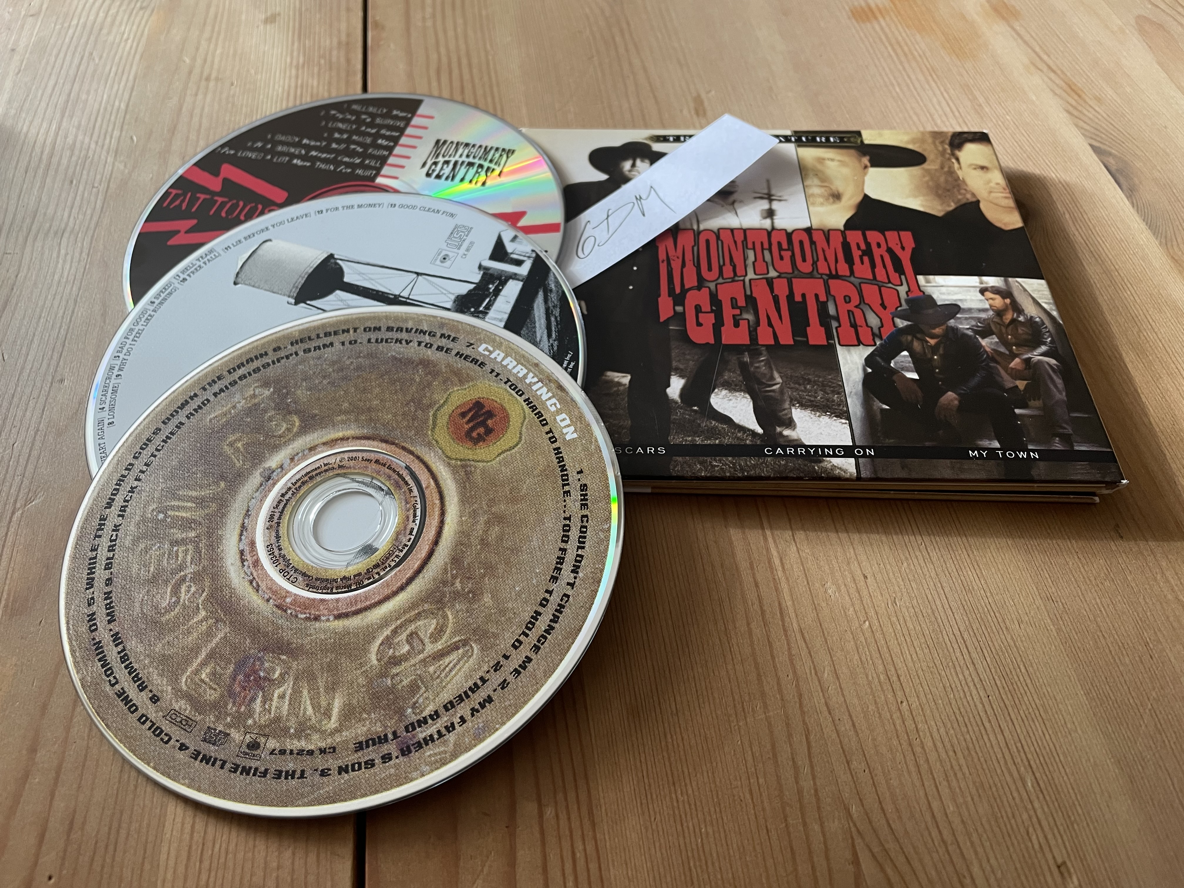 Montgomery Gentry-Triple Feature (Tattoos and Scars Carrying On My Town)-(88697-37189- 2)-3CD-FLAC-2009-6DM Download