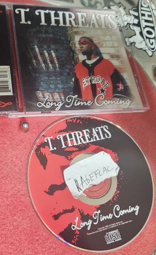 T. Threats - Long Time Coming (2003) Download