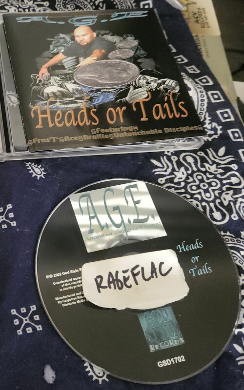 A.G.E. – Heads Or Tails (2002)